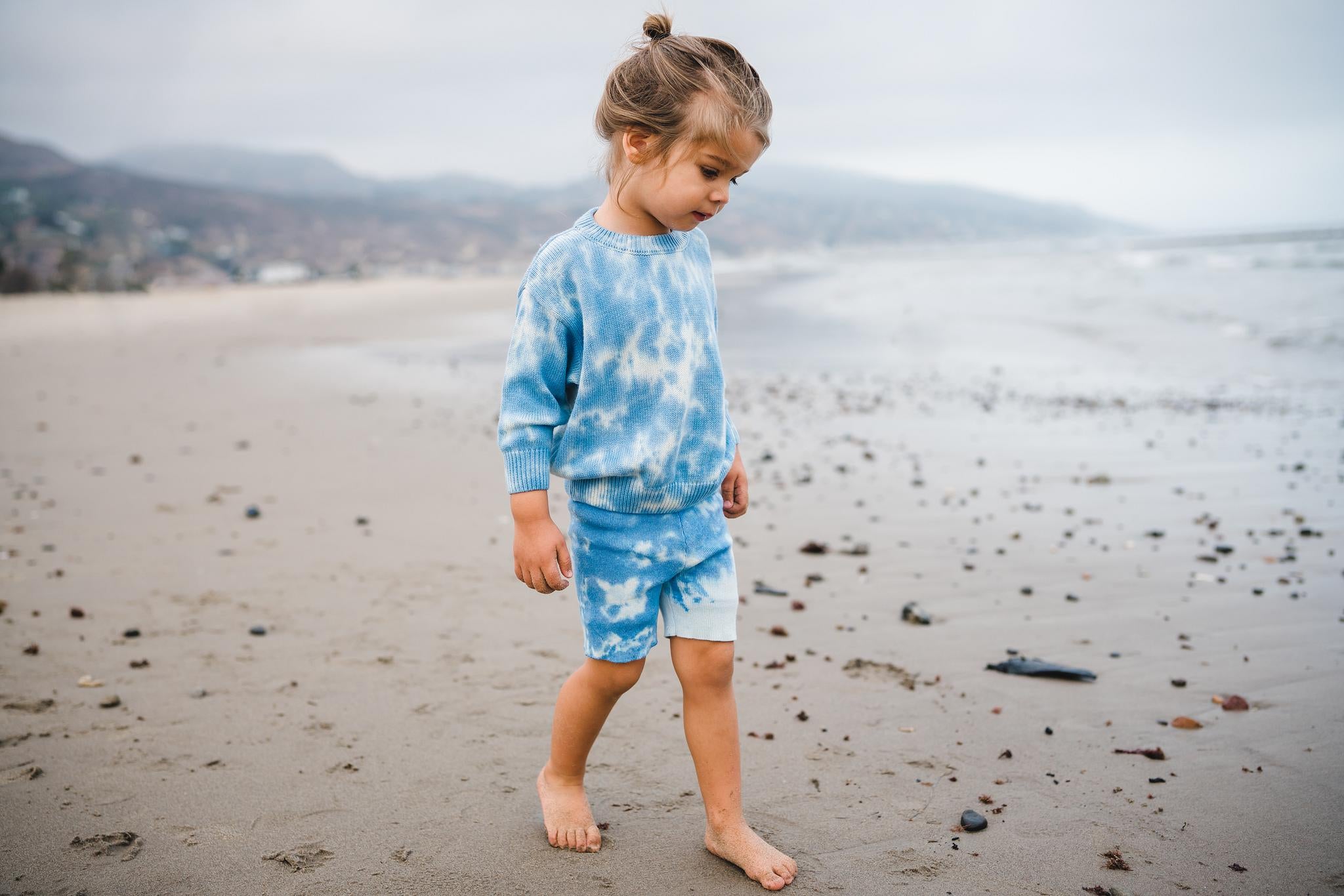 Kids light blue tie dye sweater and shorts. 