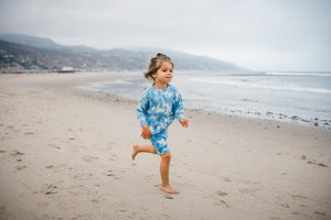 Kids light blue tie dye sweater and shorts. 