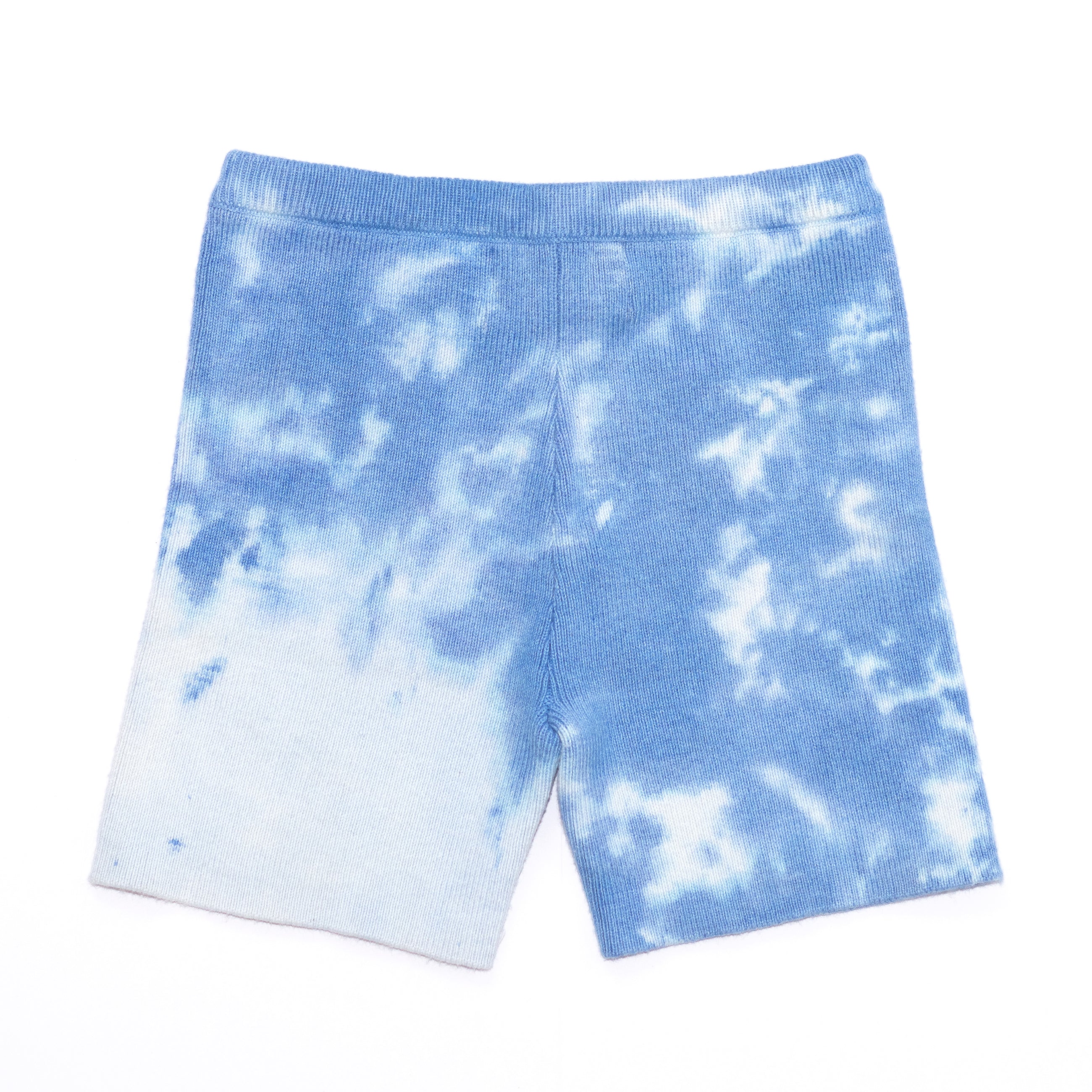 Back product shot of kids light blue tie dye shorts. 