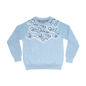 Front of women's chambray blue bandana pattern sweater. 