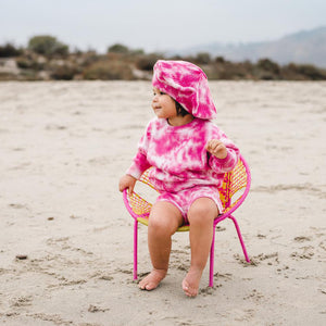 Kids fuchsia pink tie dye beret hat, matching sweater and shorts. 