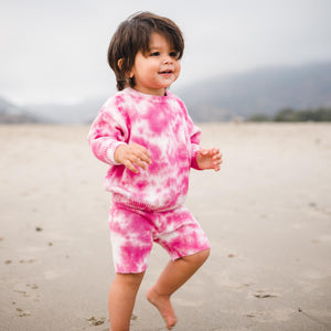 Kids fuchsia pink tie dye sweater and shorts. 